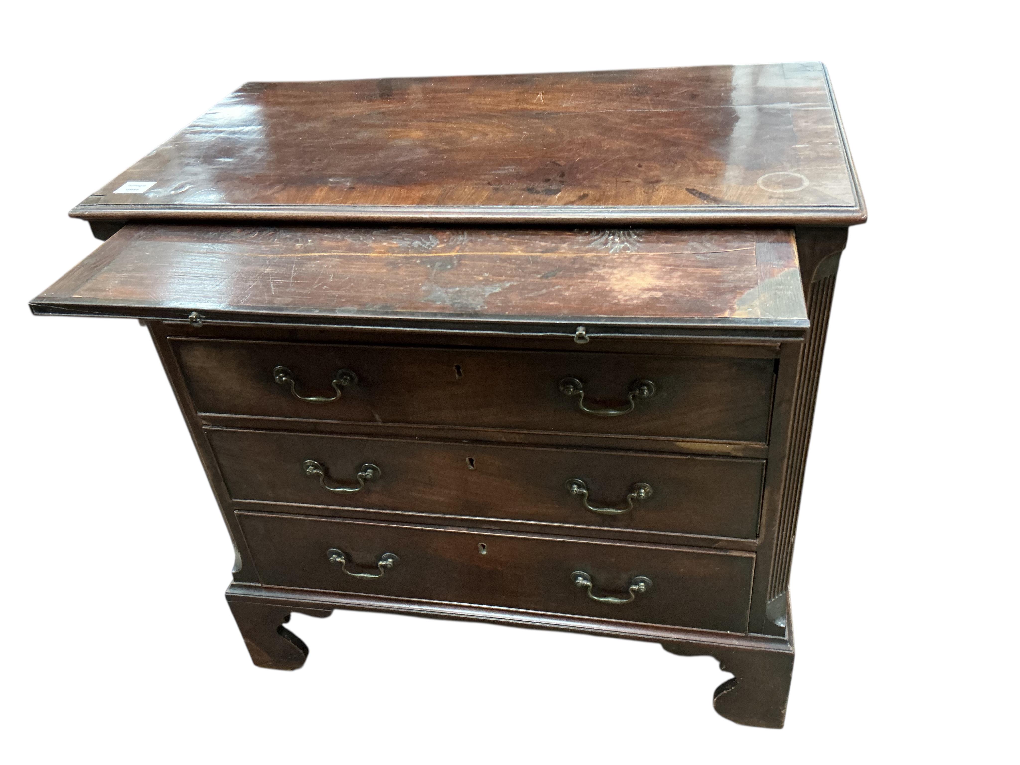 A George III mahogany chest of four drawers with brushing slide, width 87cm, depth 46cm, height 86cm